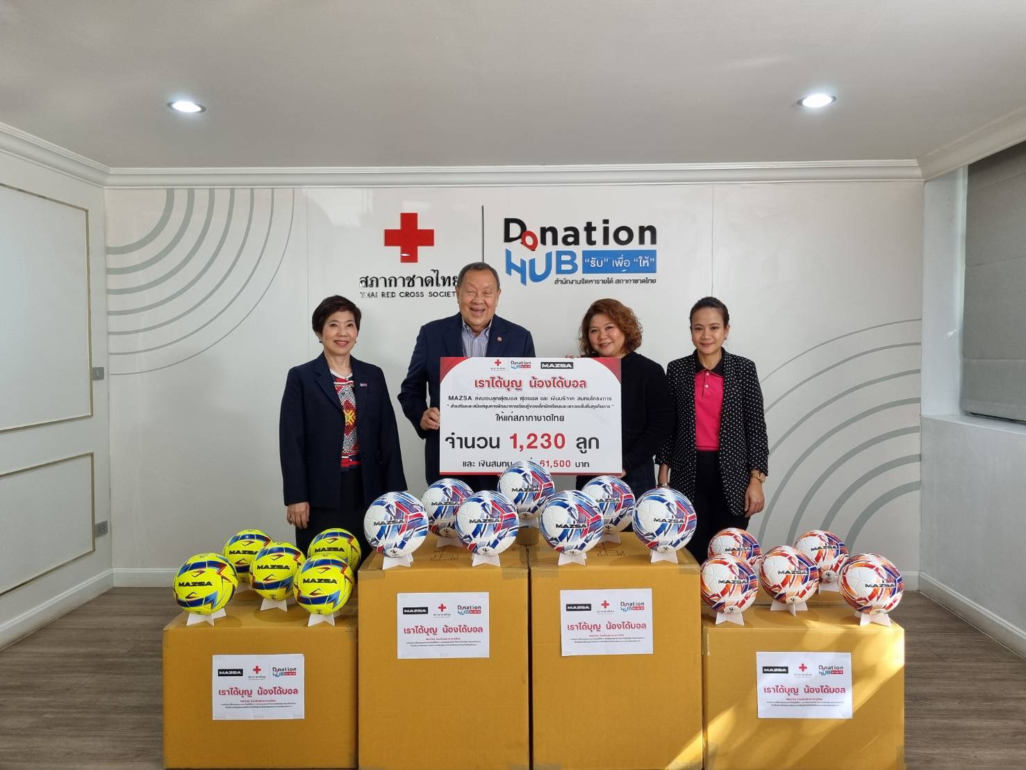 Handing over the first round of balls "Project We Get Merit, You Get Football"